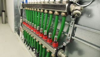 product photo, manifold with green pipes